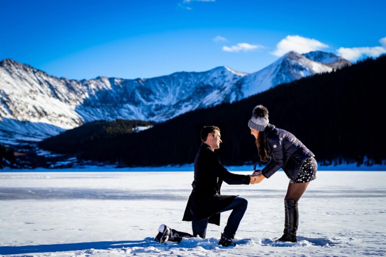 Summit County Winter proposal in the mountains surrounded by snowcapped mountains in Colorado.