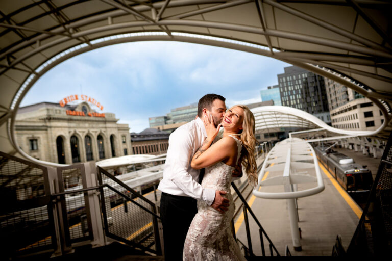 Portrait of bride and groom at the Denver Union Station in Denver for their winter wedding.