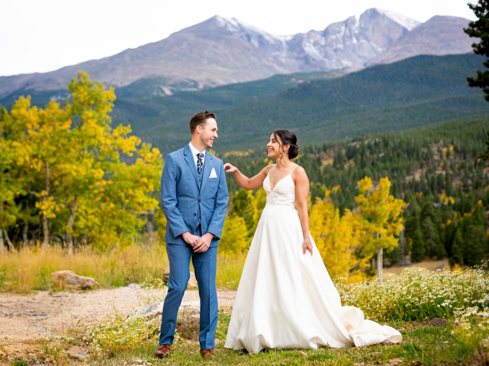 A groom turns to look at his bride during their first look at Dao House